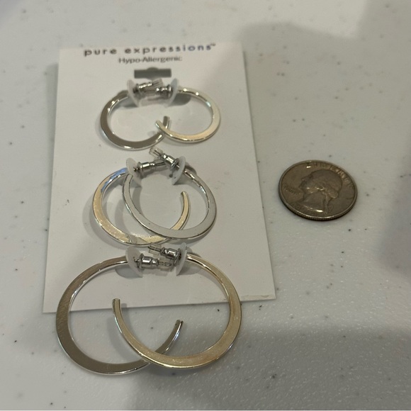 NWT 2 packs - 4 total pairs of silver tone earrings. Classic Hoop style 3 sizes - Picture 10 of 10